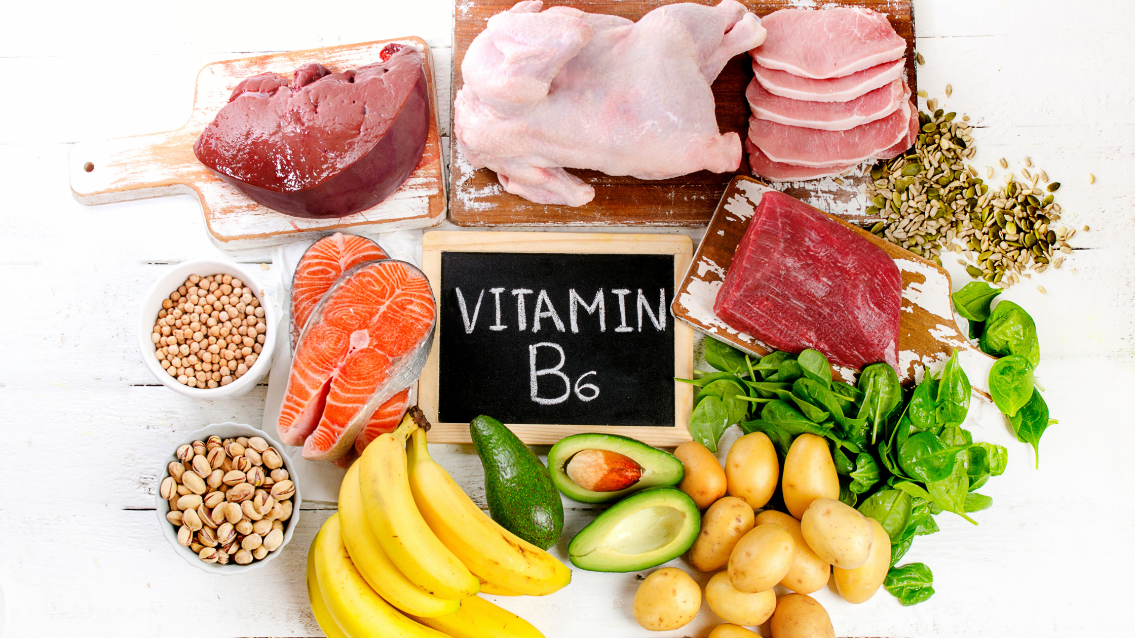 Variety of foods rich in Vitamin B6 including meat, fish, bananas, avocado, and spina