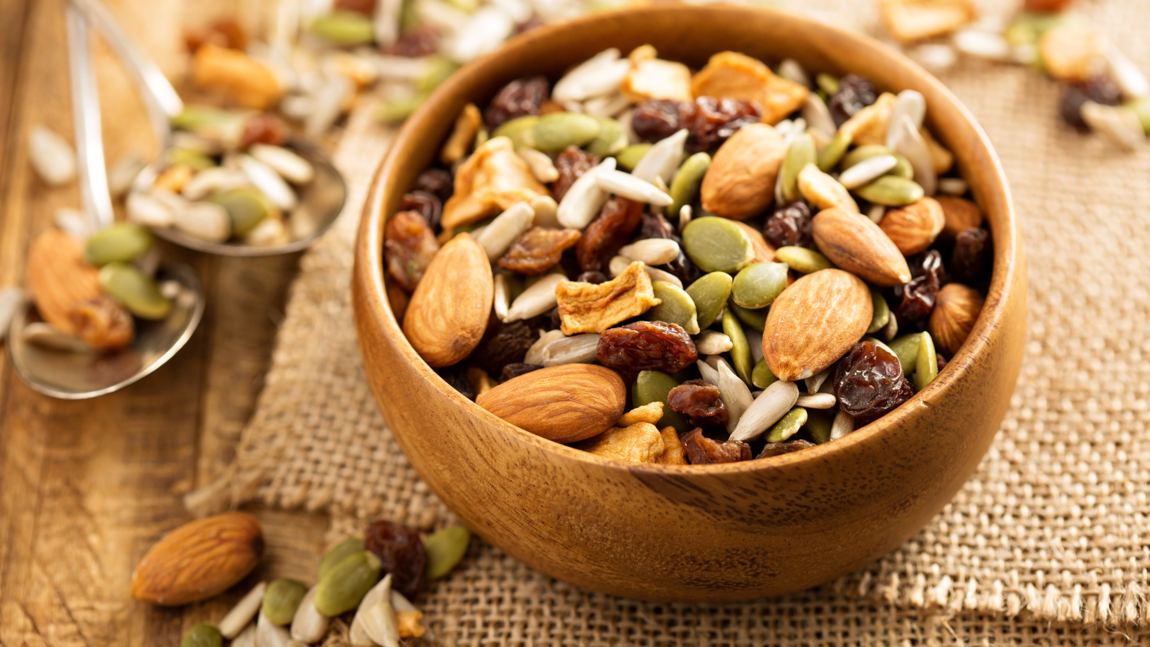 Bowl of mixed nuts and dried fruits with seeds