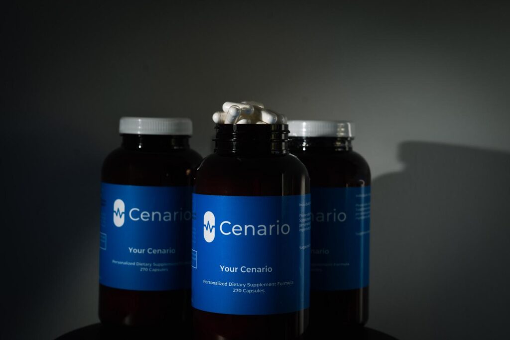 Bottle of brain booster supplement with capsules, designed to support cognitive function, memory, and mental clarity, placed on a white background.