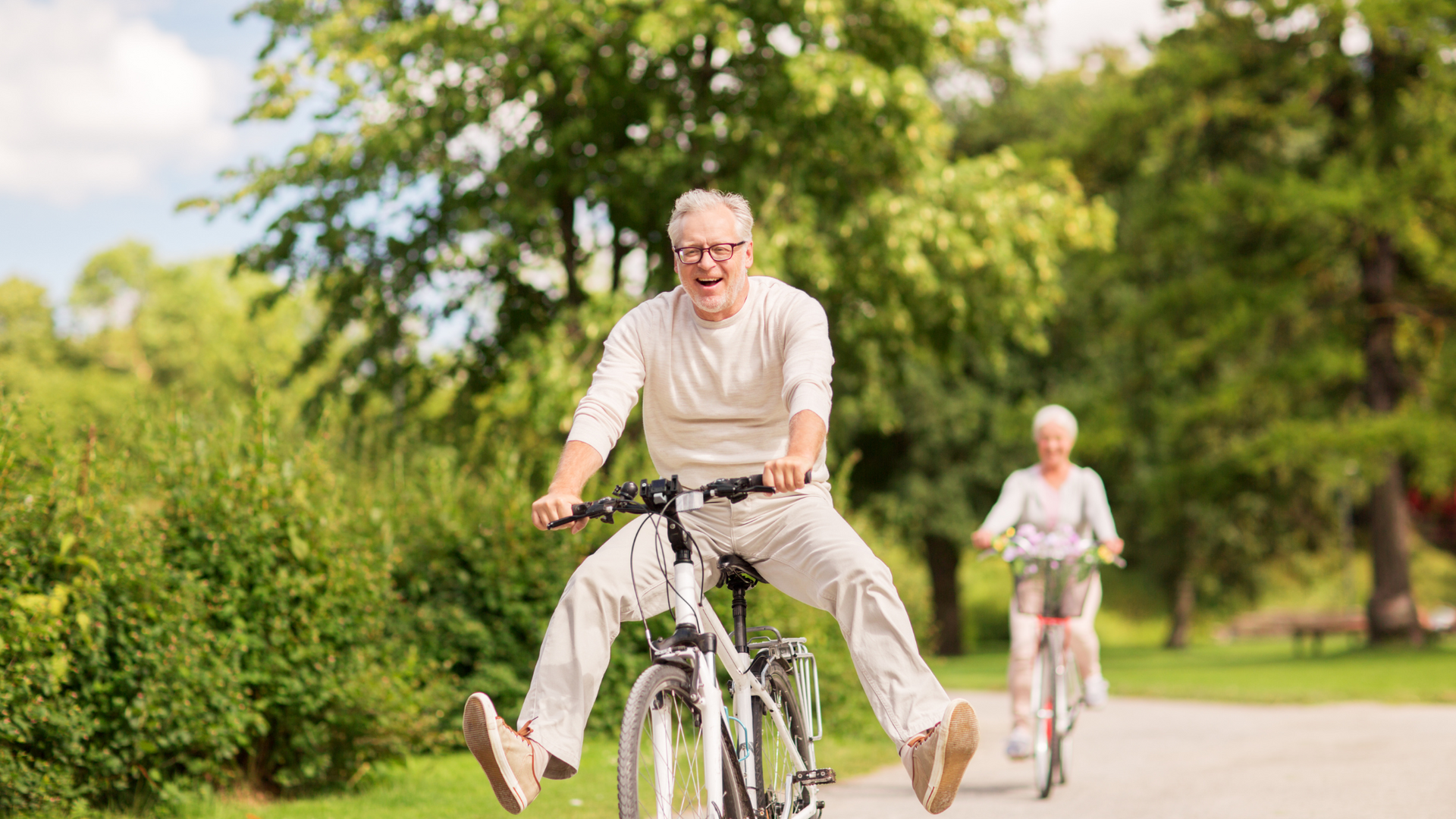 A smiling person enjoys a peaceful walk in nature, symbolizing simple habits and mindful practices for achieving greater happiness and well-being in life.
