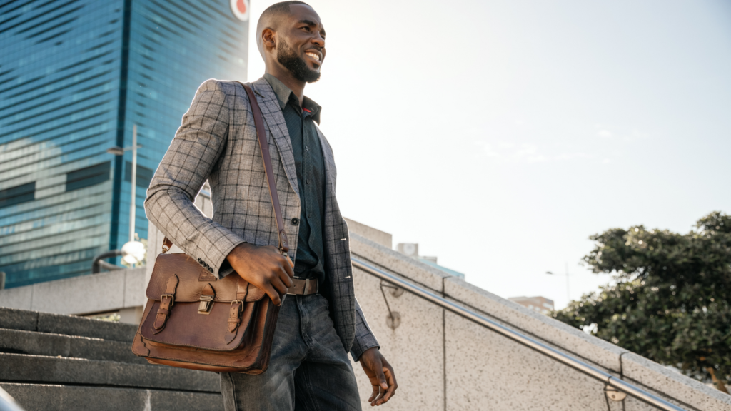 A vibrant sunrise over a city skyline with a person jogging, symbolizing fresh energy and positivity for Monday motivation and a productive week ahead.