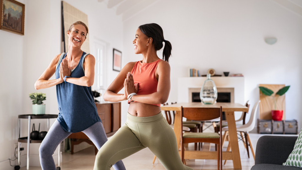 A group of people participating in a wellness challenge, tracking steps on fitness bands and sharing healthy meals in a supportive, motivating environment.