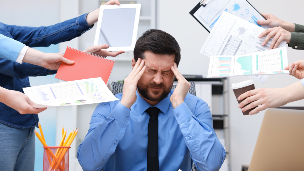 A surgeon performing a complex operation in a busy hospital operating room, illustrating the high stress levels associated with the medical profession.