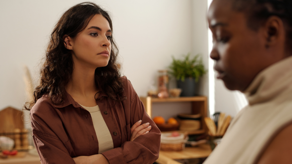 Illustration showing a person with an aggressive passive personality, displaying conflicting body language of assertiveness and withdrawal in a social setting.