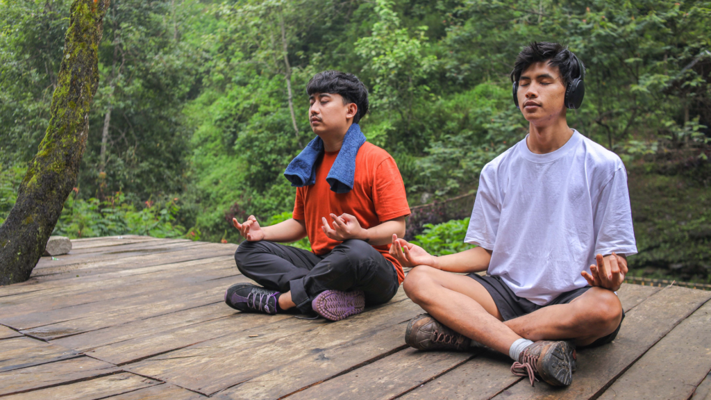Illustration highlighting Men's Mental Health Month, featuring diverse men supporting each other with mental health symbols and awareness ribbons in the background.
