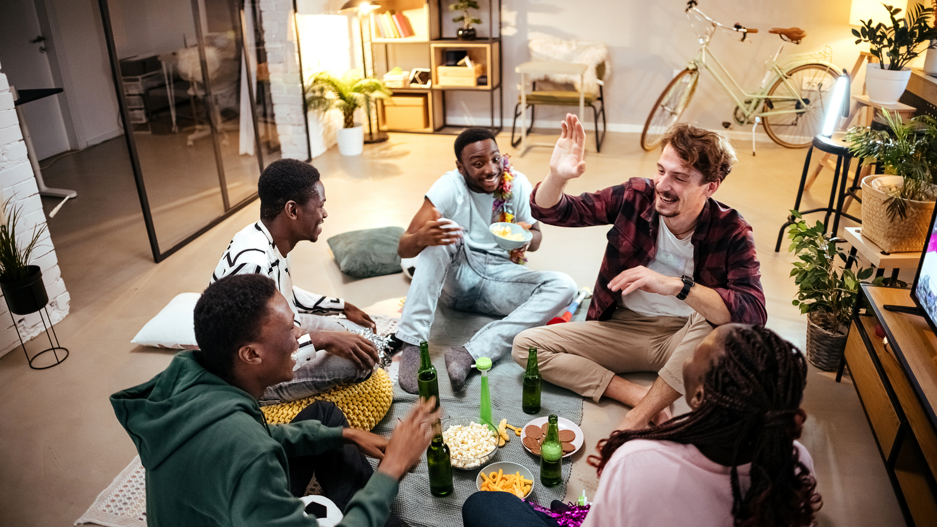 A group of diverse people engaging in a lively discussion at a community event, illustrating active social interest and participation.