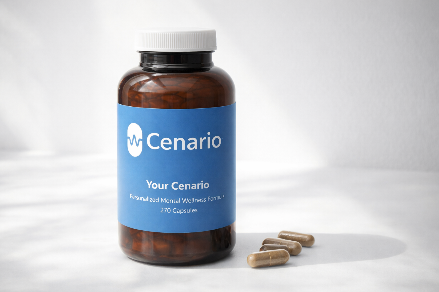 Bottle of Cenario mental wellness capsules with a few capsules beside it