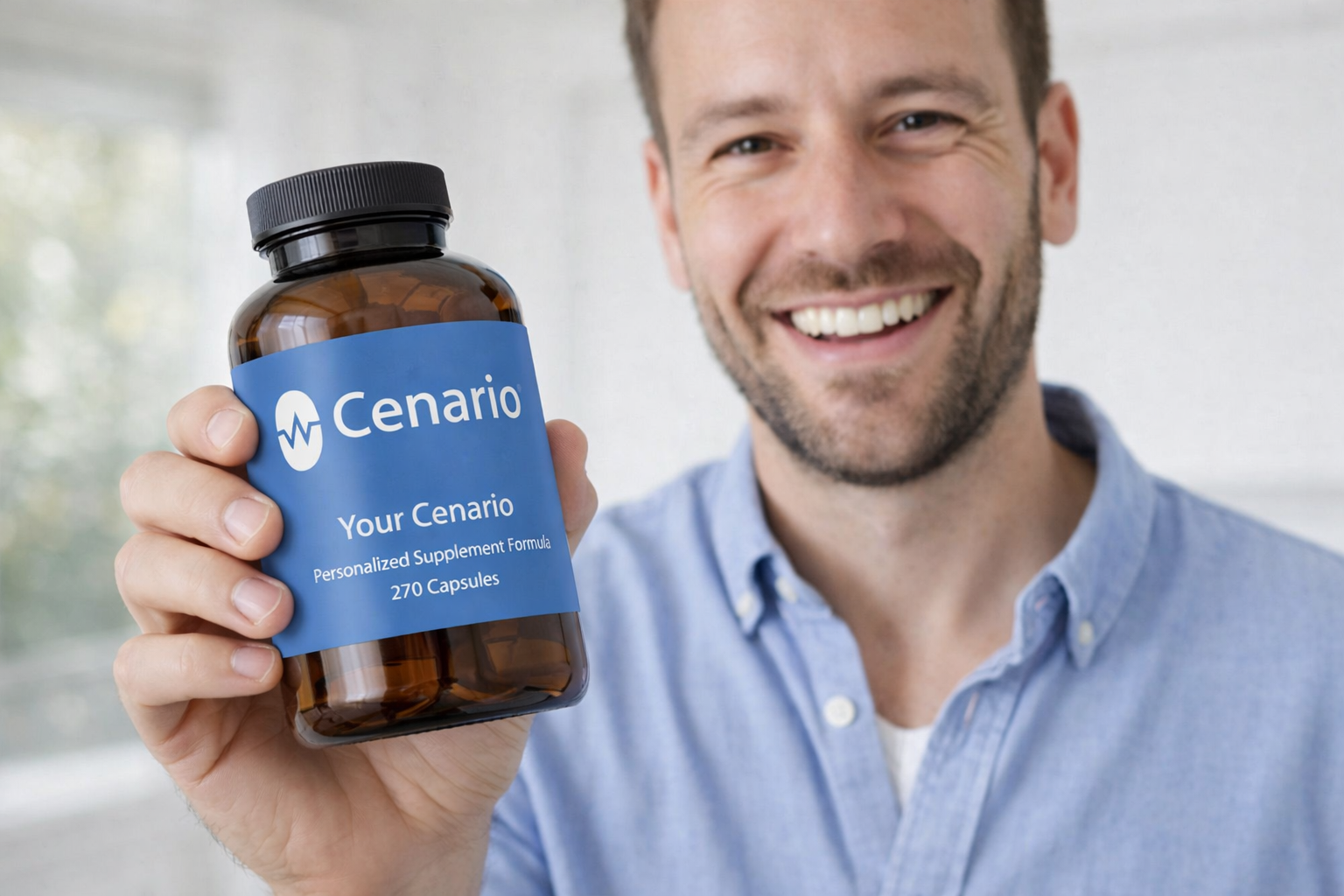 Smiling man holding a Cenario supplement bottle