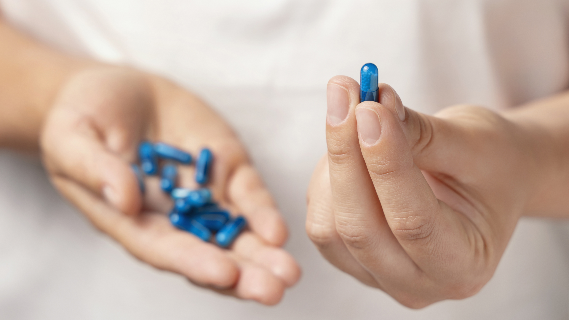 A close-up image of prescription medication bottles with clear dosage instructions printed on the labels, emphasizing correct medication dosage.
